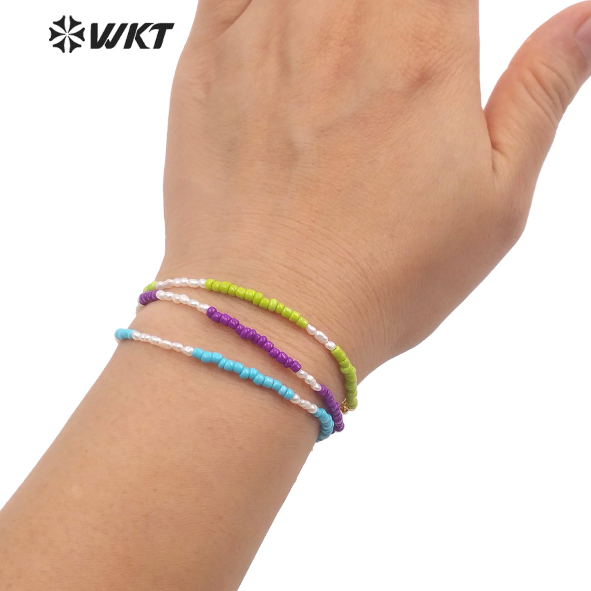 WT-MPB079 Women Elegant Tiny 2 - مراجعة Ceramic Link Bracelet وسعره